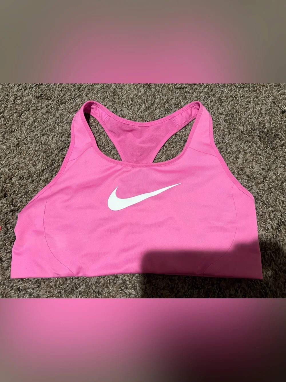 Nike Pink Racerback sports bra with White Swoosh